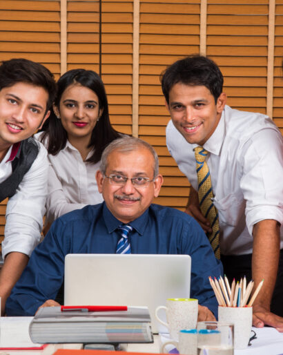Asian Indian Business People or Corporate culture and Working in the office Concept with Laptop, papers, meetings, presentations and discussions