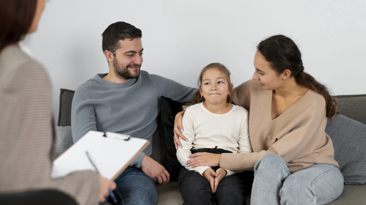 close-up-girl-therapy-session-with-parents education